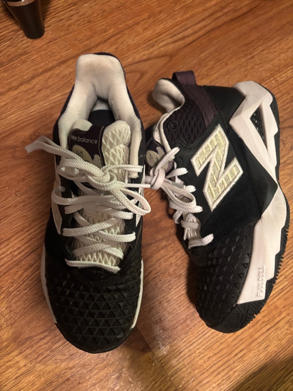New Balance Black and White Low-Top Athletic Sneakers